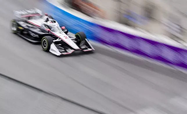 Team Penske driver Josef Newgarden races during a qualifying session for the IndyCar Grand Prix of Long Beach auto race Saturday, April 20, 2024, in Long Beach, Calif. (AP Photo/Ryan Sun)