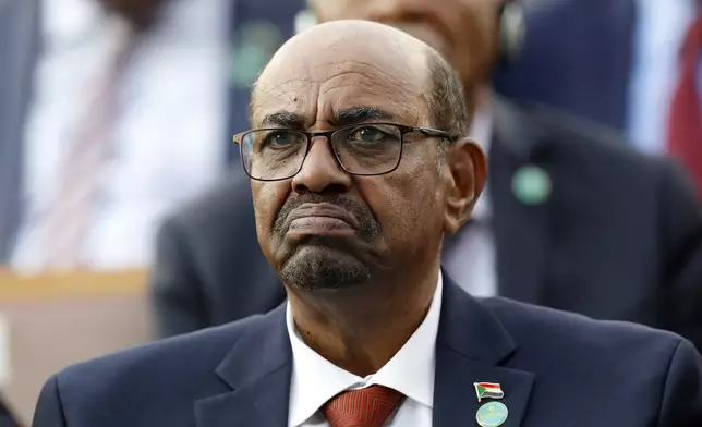 FILE - Sudan's President Omar al-Bashir attends a ceremony for Turkey's President Recep Tayyip Erdogan, at the Presidential Palace, July 9, 2018, in Ankara, Turkey. Ousted Sudanese strongman Omar al-Bashir was charged by the International Criminal Court on allegations including genocide in his country's Darfur region. (AP Photo/Burhan Ozbilici, File)