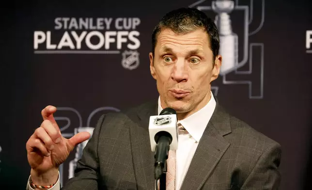 Carolina Hurricanes head coach Rod Brind'Amour speaks at a news conference following Game 2 of an NHL hockey Stanley Cup first-round playoff series against the New York Islanders in Raleigh, N.C., Monday, April 22, 2024. (AP Photo/Karl B DeBlaker)