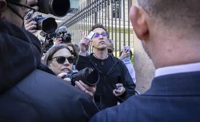Columbia University assistant professor Shai Davidai, is denied access to the main campus after his security card was deactivated, to prevent him from accessing the lawn currently occupied by pro-Palestine student demonstrators in New York on Monday, April 22, 2024. (AP Photo/Stefan Jeremiah)