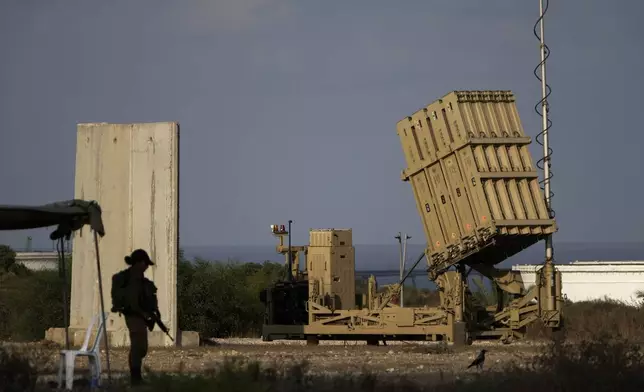 FILE - A battery of Israel's Iron Dome defense missile system, deployed to intercept rockets, sits in Ashkelon, southern Israel, Aug. 7, 2022. Israel is vowing to retaliate against Iran, risking further expanding the shadow war between the two foes into a direct conflict after an Iranian attack over the weekend sent hundreds of drones and missiles toward Israel. (AP Photo/Ariel Schalit, File)