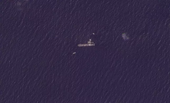 This satellite photo from Planet Labs PBC shows the USNS Roy P. Benavidez in the Mediterranean Sea off shore from the Gaza Strip on Sunday, April 28, 2024. A U.S. Navy ship involved in the American-led effort to bring more aid into the besieged Gaza Strip is off shore from the enclave, slowly building out a floating platform for the operation, satellite photos analyzed Monday, April 29, 2024, by The Associated Press show. (Planet Labs PBC via AP)