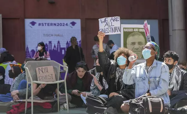 New York University students and pro-Palestinian supporters rally outside the NYU Stern School of Business building, Monday, April 22, 2024, in New York. (AP Photo/Mary Altaffer)