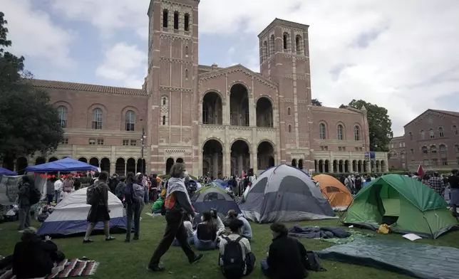 A makeshift camp supporting the Palestinians cause is staged on the UCLA campus, Thursday, April 25, 2024, in Los Angeles. (AP Photo/Jae C. Hong)