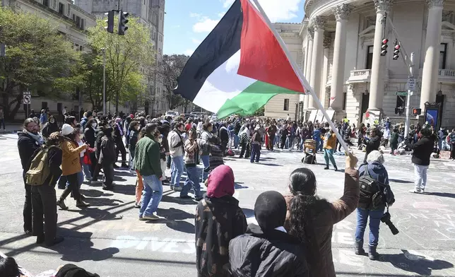 Several hundred students and pro-Palestinian supporters rally at the intersection in front of Woolsey Hall on the campus of Yale University in New Haven, Conn. April 22, 2024. (Ned Gerard/Hearst Connecticut Media via AP)