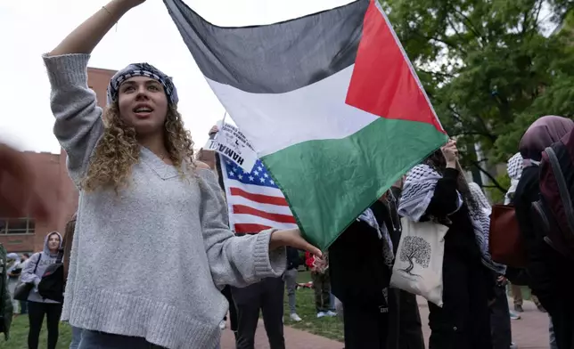 George Washington University students rally on campus during a pro-Palestinian protest over the Israel-Hamas war on Thursday, April 25, 2024, in Washington. (AP Photo/Jose Luis Magana)