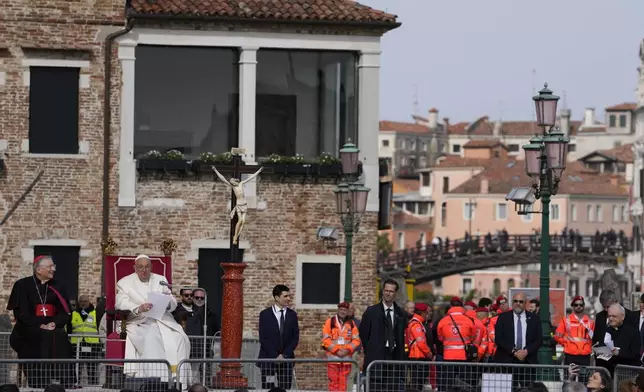 Pope Francis delivers his message as he meets with youths in Venice, Italy, Sunday, April 28, 2024. The Pontiff arrived for his first-ever visit to the lagoon town including the Vatican pavilion at the 60th Biennal of Arts. (AP Photo/Alessandra Tarantino)