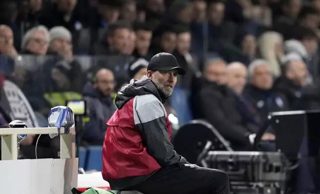 Liverpool's manager Jurgen Klopp sits by the touchline during the Europa League quarterfinal, second leg, soccer match between Atalanta and Liverpool at the Stadio di Bergamo, in Bergamo, Italy, Thursday, April 18, 2024. (AP Photo/Antonio Calanni)