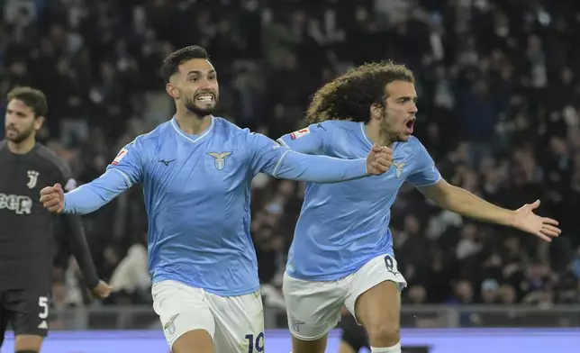 Lazio's Taty Castellanos, front left, celebrates after scoring his side's second goal during the Italian Cup semi-final soccer match between Lazio and Juventus at Rome's Olympic Stadium, Italy, Tuesday, April 23, 2024. (Fabrizio Corradetti/LaPresse via AP)