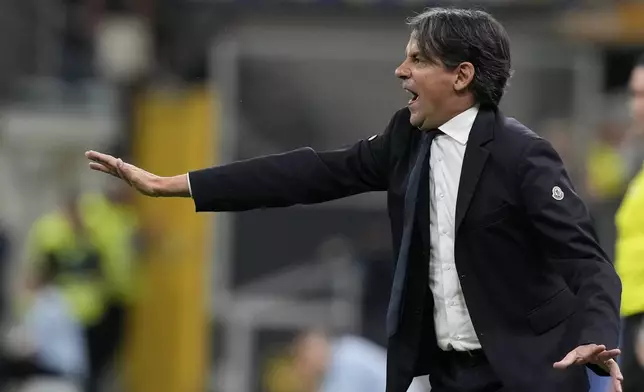 Inter Milan's head coach Simone Inzaghi yells during the Italian Serie A soccer match between Inter Milan and Cagliari at the San Siro stadium in Milan, Italy, Sunday, April 14, 2024. (AP Photo/Antonio Calanni)