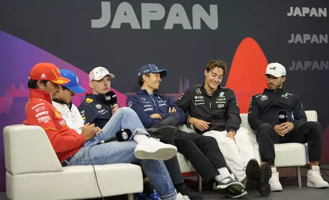 Red Bull driver Max Verstappen of the Netherlands, their left, speaks as Ferrari driver Carlos Sainz of Spain, from left, Yuki Tsunoda of Japan, driver of RB, the team previously known as AlphaTauri, Williams driver Alexander Albon of Thailand, Mercedes driver George Russell of Britain and Alpine driver Pierre Gasly of France listen during a news conference at the Suzuka Circuit in Suzuka, central Japan, Thursday, April 4, 2024, ahead of Sunday's Japanese Formula One Grand Prix. (AP Photo/Hiro Komae)