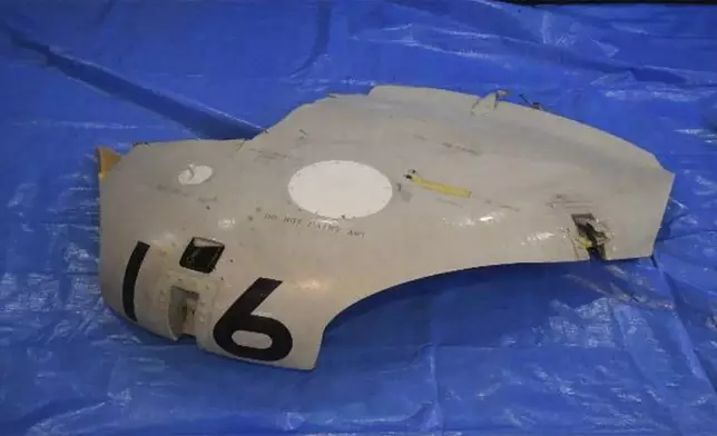 This image released by Japan Maritime Self-Defense Force shows a retrieved component which is believed to be a part of a crashed helicopter, Sunday, April 21, 2024. Initial analysis of flight data recorders recovered from the waters in the Pacific near the crash site of the two Japanese navy helicopters showed no sign that mechanical problems in the aircraft caused the accident, Japan’s defense minister said Monday, as he indicated human error. (Japan Maritime Self-Defense Force via AP)
