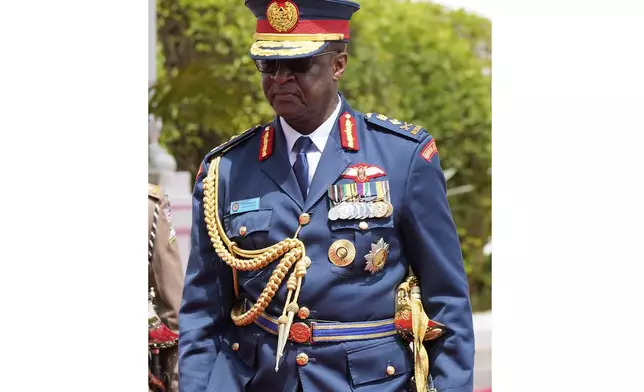 FILE - Kenya's military chief General Francis Ogolla is dressed in full uniform at the State House in Nairobi, Kenya, Nov. 14, 2023. Ogolla died in a helicopter crash west of the country, President William Ruto announced Thursday, April 18, 2024, evening and declared three days of national mourning. (AP Photo/Brian Inganga, File)