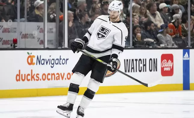 Los Angeles Kings right wing Adrian Kempe (9) reacts after a blocked shot during the third period of an NHL hockey game against the Anaheim Ducks, Tuesday, April 9, 2024, in Anaheim, Calif. (AP Photo/William Liang)