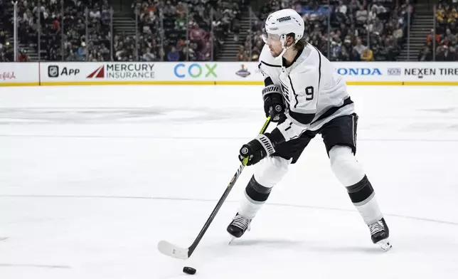Los Angeles Kings right wing Adrian Kempe (9) looks to shoot the puck during the second period of an NHL hockey game against the Anaheim Ducks, Tuesday, April 9, 2024, in Anaheim, Calif. (AP Photo/William Liang)