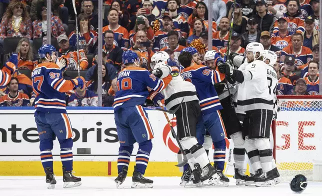 Los Angeles Kings and the Edmonton Oilers rough it up during the first period of Game 1 in first-round NHL Stanley Cup playoff hockey action in Edmonton, Alberta, Monday, April 22, 2024. (Jason Franson/The Canadian Press via AP)