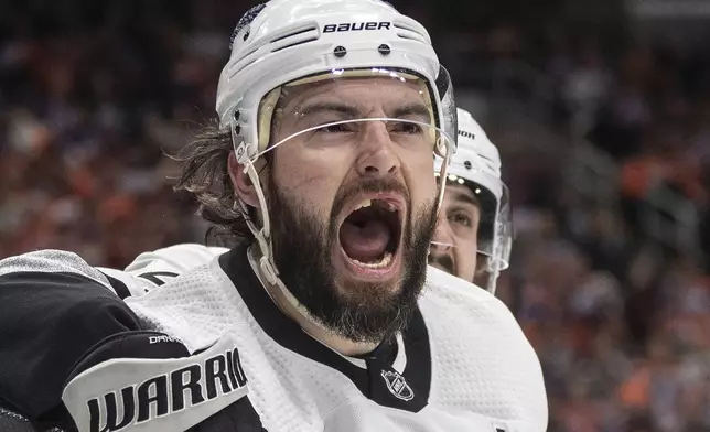 Los Angeles Kings' Drew Doughty (8) celebrates his goal against the Edmonton Oilers during the first period of Game 2 of an NHL hockey Stanley Cup first-round playoff series Wednesday, April 24, 2024, in Edmonton, Alberta. (Jason Franson/The Canadian Press via AP)