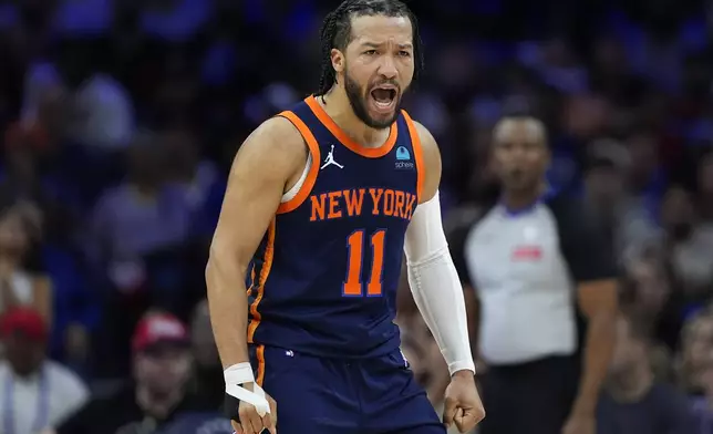 New York Knicks' Jalen Brunson reacts during the first half of Game 4 in an NBA basketball first-round playoff series against the Philadelphia 76ers, Sunday, April 28, 2024, in Philadelphia. (AP Photo/Matt Slocum)