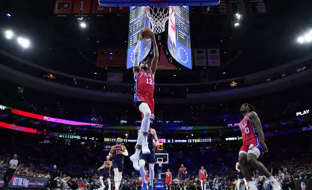 Philadelphia 76ers' Tobias Harris (12) goes up for a dunk during the first half of Game 4 in an NBA basketball first-round playoff series against the New York Knicks, Sunday, April 28, 2024, in Philadelphia. (AP Photo/Matt Slocum)