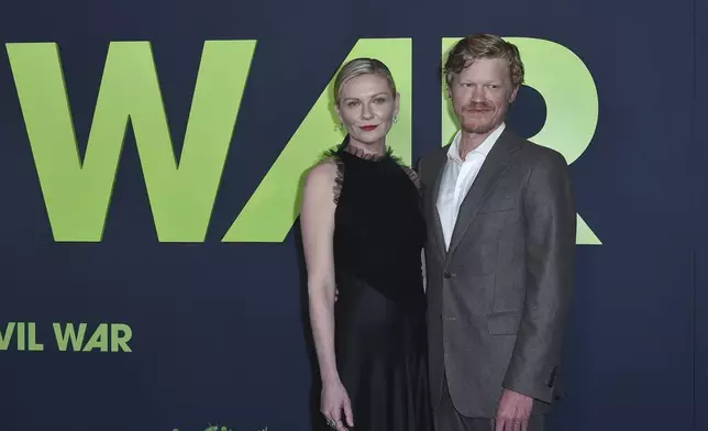 Kirsten Dunst, left, and Jesse Plemons attend a special screening of A24's "Civil War" at the Tedd Mann Theater at the Academy Museum of Motion Pictures on Tuesday, April, 2, 2024, in Los Angeles. (Photo by Richard Shotwell/Invision/AP)