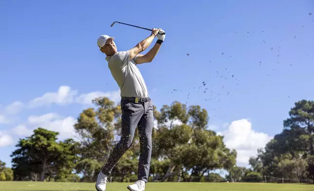 Captain Martin Kaymer of Cleeks GC hits his shot on the 18th hole during the practice round for LIV Golf Adelaide at the Grange Golf Club Thursday, April 25, 2024, in Adelaide, Australia. (Chris Trotman/LIV Golf via AP)