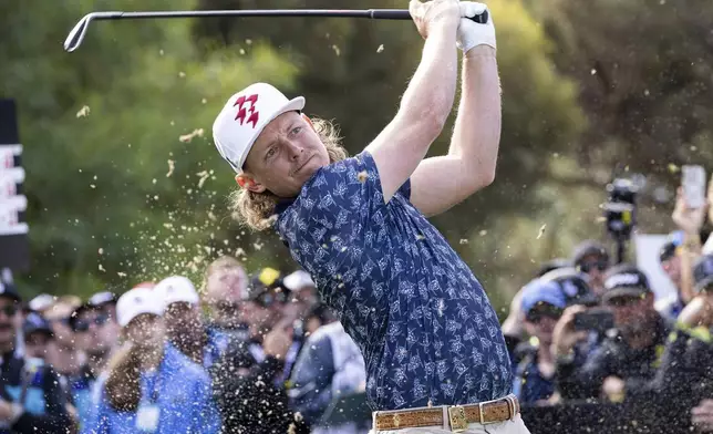 Captain Cameron Smith of Ripper GC hits his shot from the 14th tee during the first round of LIV Golf Adelaide at the Grange Golf Club Friday, April 26, 2024, in Adelaide, Australia. (LIV Golf via AP)