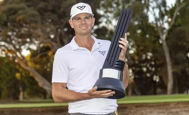 Individual Champion Brendan Steele of HyFlyers GC poses with the trophy after the final round of LIV Golf Adelaide at the Grange Golf Club on Sunday, April 28, 2024, in Adelaide, Australia. (Chris Trotman/LIV Golf via AP)
