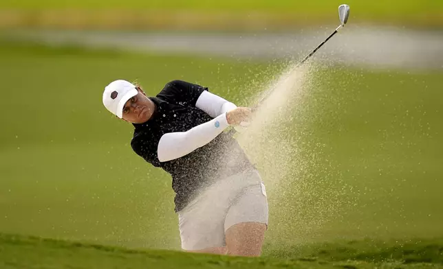 Lauren Coughlin hits from the fifth fairway bunker during the first round of the Chevron Championship LPGA golf tournament Thursday, April 18, 2024, at The Club at Carlton Woods, in The Woodlands, Texas. (AP Photo/Eric Gay)
