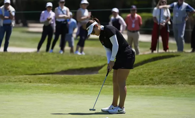 Hannah Green putts on the first green during the fourth round of the LPGA's JM Eagle LA Championship golf tournament at Wilshire Country Club, Sunday, April 28, 2024, in Los Angeles. (AP Photo/Ashley Landis)