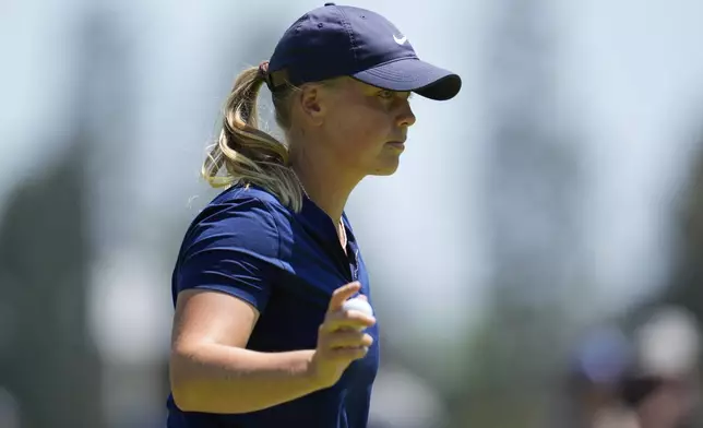 Maja Stark reacts after making a putt on the first green during the fourth round of the LPGA's JM Eagle LA Championship golf tournament at Wilshire Country Club, Sunday, April 28, 2024, in Los Angeles. (AP Photo/Ashley Landis)
