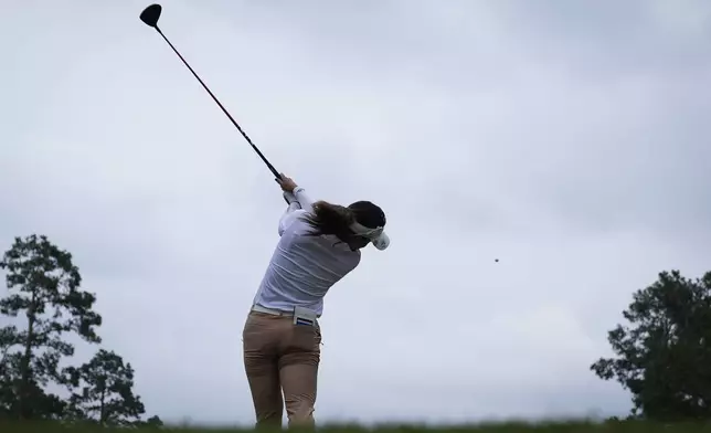 Atthaya Thitikul, of Thailand, hits from the sixth tee during the third round of the Chevron Championship LPGA golf tournament Saturday, April 20, 2024, at The Club at Carlton Woods, in The Woodlands, Texas. (AP Photo/Eric Gay)