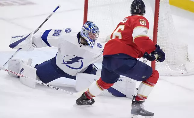 Florida Panthers center Aleksander Barkov (16) scores against Tampa Bay Lightning goaltender Andrei Vasilevskiy (88) during the second period of Game 5 of the first-round of an NHL Stanley Cup Playoff series, Monday, April 29, 2024, in Sunrise, Fla. (AP Photo/Wilfredo Lee)