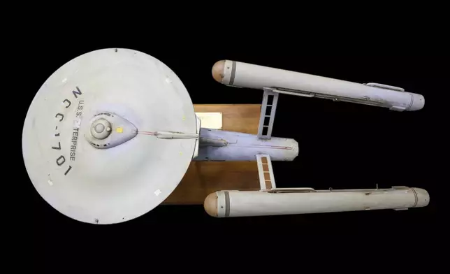 The first model of the USS Enterprise is displayed at Heritage Auctions in Los Angeles, April 13, 2024. The model — used in the original “Star Trek” television series — has been returned to Eugene “Rod” Roddenberry, the son of “Star Trek” creator Gene Roddenberry, decades after it went missing in the 1970s. (Josh David Jordan/Heritage Auctions via AP)