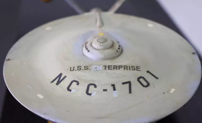 The first model of the USS Enterprise is displayed at Heritage Auctions in Los Angeles, April 13, 2024. The model — used in the original “Star Trek” television series — has been returned to Eugene “Rod” Roddenberry, the son of “Star Trek” creator Gene Roddenberry, decades after it went missing in the 1970s. (Josh David Jordan/Heritage Auctions via AP)