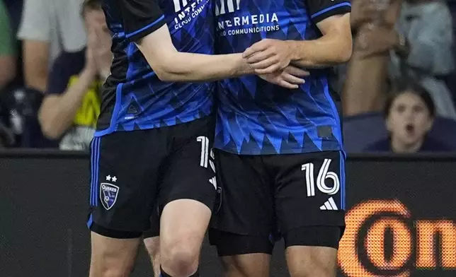 San Jose Earthquakes midfielder Jack Skahan (16) celebrates his goal with defender Tanner Beason, left, during the second half of an MLS soccer match Saturday, April 27, 2024, in Nashville, Tenn. The Earthquakes and Nashville played to a 1-1 draw. (AP Photo/George Walker IV)