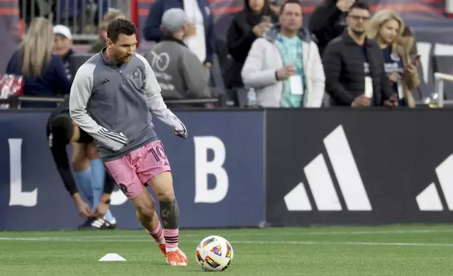 Inter Miami forward Lionel Messi (10) warms up before an MLS soccer match against the New England Revolution, Saturday, April 27, 2024, in Foxborough, Mass. (AP Photo/Mark Stockwell)