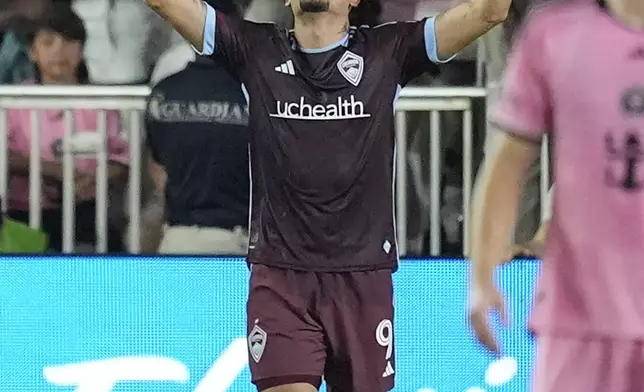 Colorado Rapids forward Rafael Navarro (9) celebrates after scoring against Inter Miami on a penalty kick during the first half of an MLS soccer match Saturday, April 6, 2024, in Fort Lauderdale, Fla. (AP Photo/Rebecca Blackwell)