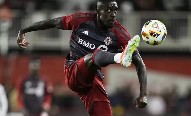 Toronto FC's Prince Osei Owusu controls the ball against the New England Revolution during second-half MLS soccer match action in Toronto, Saturday, April 20, 2024. (Frank Gunn/The Canadian Press via AP)