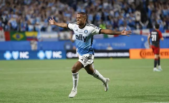 Charlotte FC forward Kerwin Vargas celebrates after scoring a goal against Toronto FC during the first half of an MLS soccer match in Charlotte, N.C., Saturday, April 13, 2024. (AP Photo/Nell Redmond)