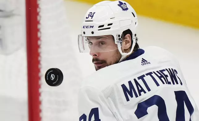 Toronto Maple Leafs' Auston Matthews watches the puck during the second period of the team's NHL hockey game against the Tampa Bay Lightning on Wednesday, April 17, 2024, in Tampa, Fla. (Frank Gunn/The Canadian Press via AP)