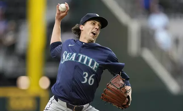 Seattle Mariners starting pitcher Logan Gilbert throws to the Texas Rangers in the first inning of a baseball game in Arlington, Texas, Tuesday, April 23, 2024. (AP Photo/Tony Gutierrez)