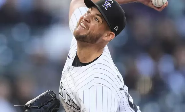 Colorado Rockies starting pitcher Peter Lambert works against the Seattle Mariners in the first inning of the second game of a baseball doubleheader Sunday, April 21, 2024, in Denver. (AP Photo/David Zalubowski)