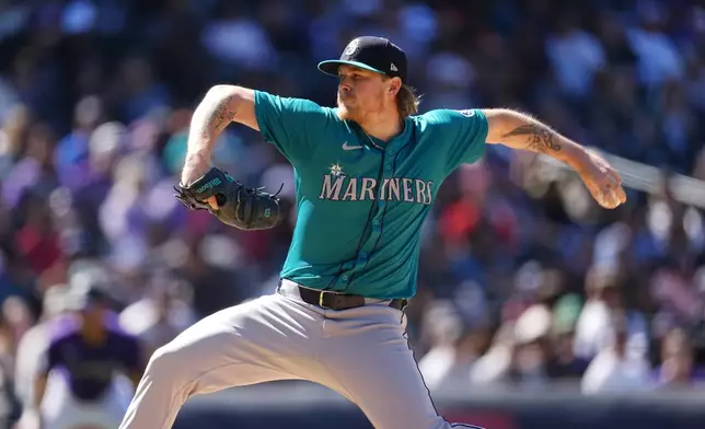 Seattle Mariners relief pitcher Gabe Speier works against the Colorado Rockies in the seventh inning of the first game of a baseball doubleheader Sunday, April 21, 2024, in Denver. (AP Photo/David Zalubowski)
