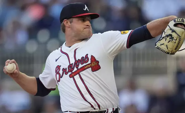 Atlanta Braves starting pitch Bryce Elder works against the Miami Marlins in the first inning of a baseball game Monday, April 22, 2024, in Atlanta. (AP Photo/John Bazemore)