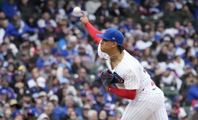 Chicago Cubs pitcher Adbert Alzolay delivers during the eighth inning in the first baseball game of a doubleheader against the Miami Marlins, Saturday, April 20, 2024, in Chicago. (AP Photo/Charles Rex Arbogast)