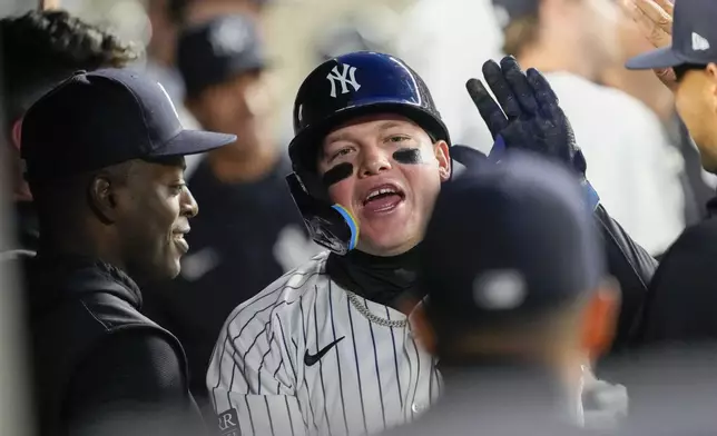 New York Yankees' Alex Verdugo celebrates after hitting a solo home run in the second inning of a baseball game against the Miami Marlins, Tuesday, April 9, 2024, in New York. (AP Photo/Mary Altaffer)