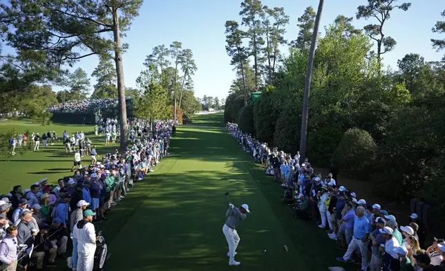 Tiger Woods hits his tee shot on the 18th hole during second round at the Masters golf tournament at Augusta National Golf Club Friday, April 12, 2024, in Augusta, Ga. (AP Photo/Matt Slocum)