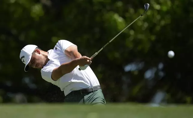Xander Schauffele hits his tee shot on the fourth hole during third round at the Masters golf tournament at Augusta National Golf Club Saturday, April 13, 2024, in Augusta, Ga. (AP Photo/Ashley Landis)