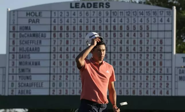 Collin Morikawa finishes his third round at the Masters golf tournament at Augusta National Golf Club Saturday, April 13, 2024, in Augusta, Ga. (AP Photo/Charlie Riedel)