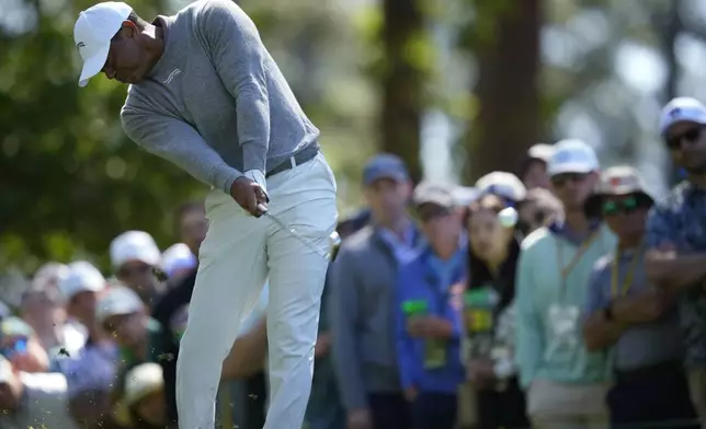 Tiger Woods hits his tee shot on the fourth hole during second round at the Masters golf tournament at Augusta National Golf Club Friday, April 12, 2024, in Augusta, Ga. (AP Photo/Matt Slocum)